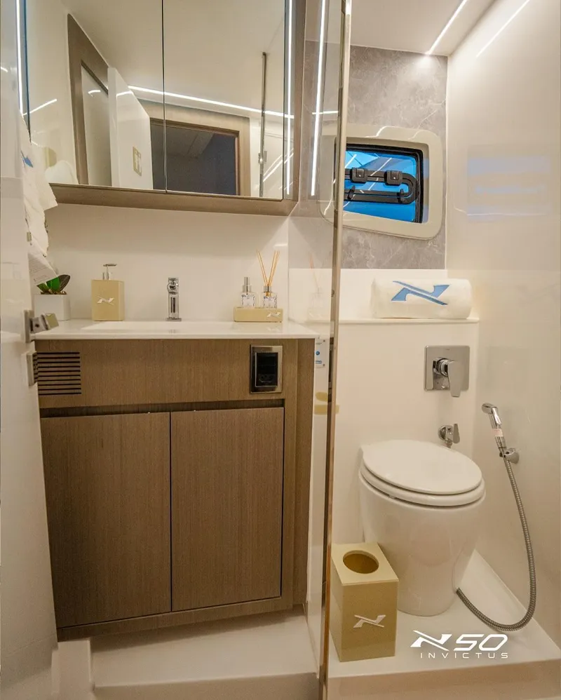 Slide: The Image of Luxurious bathroom in 2025 NX Boats NX 50 INVICTUS HT yacht, featuring modern fixtures and elegant design. - 35