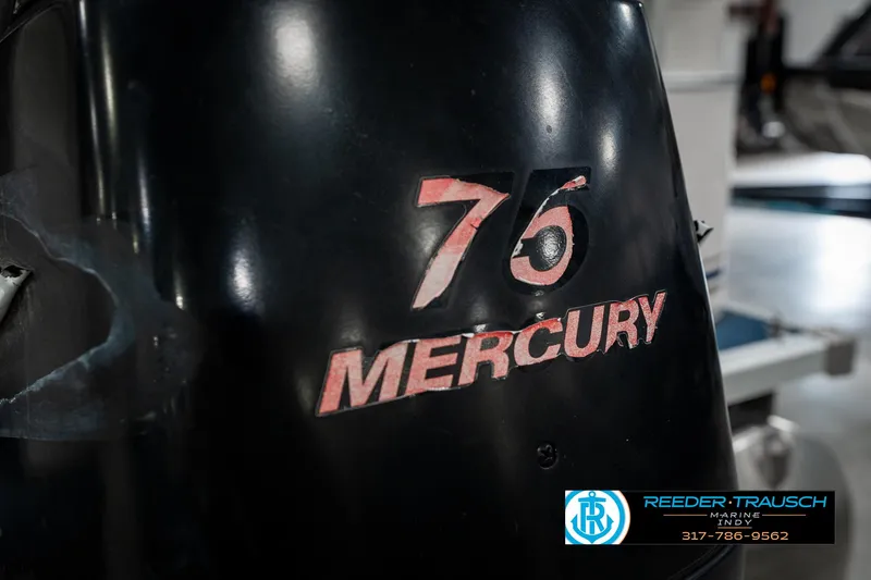 Slide: The Image of Mercury 75 outboard motor on a 2005 SunChaser 820 boat, Reeder-Trausch Marine logo visible. - 39