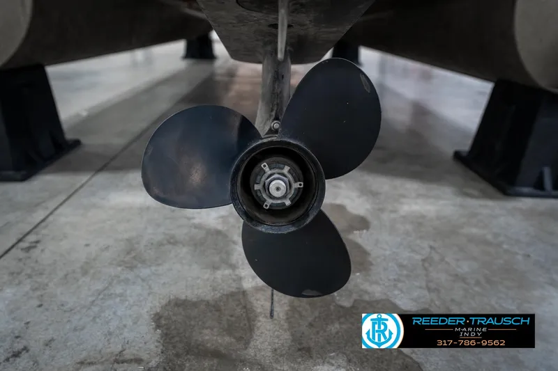 Slide: The Image of Close-up of a 2005 SunChaser 820 boat propeller in a showroom. - 40