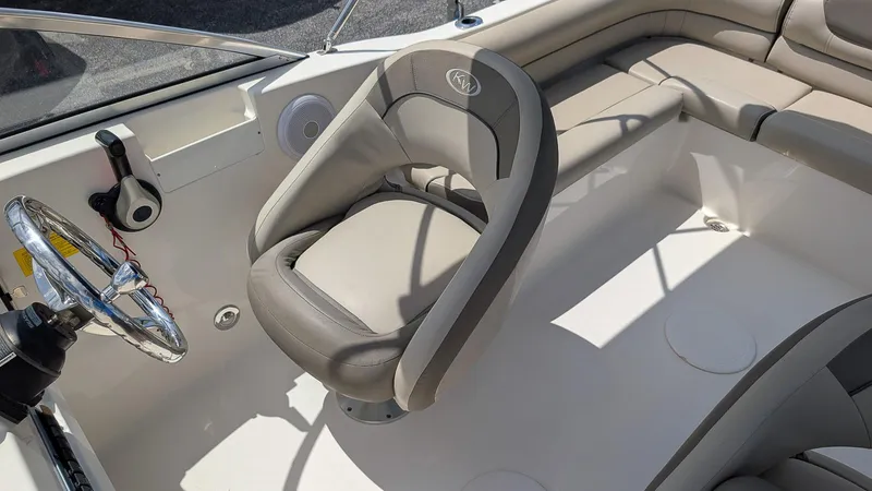 Slide: The Image of Interior of 2021 Key West 203 DFS boat with steering wheel and seating. - 12