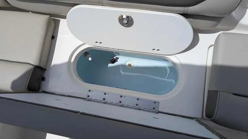 Slide: The Image of 2021 Key West 203 DFS boat livewell with open lid and seating. - 7