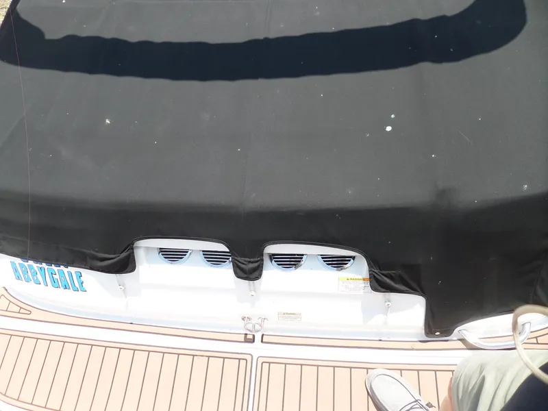 Slide: The Image of 2017 Bayliner VR6 Bowrider I/O with black cover on deck. - 11