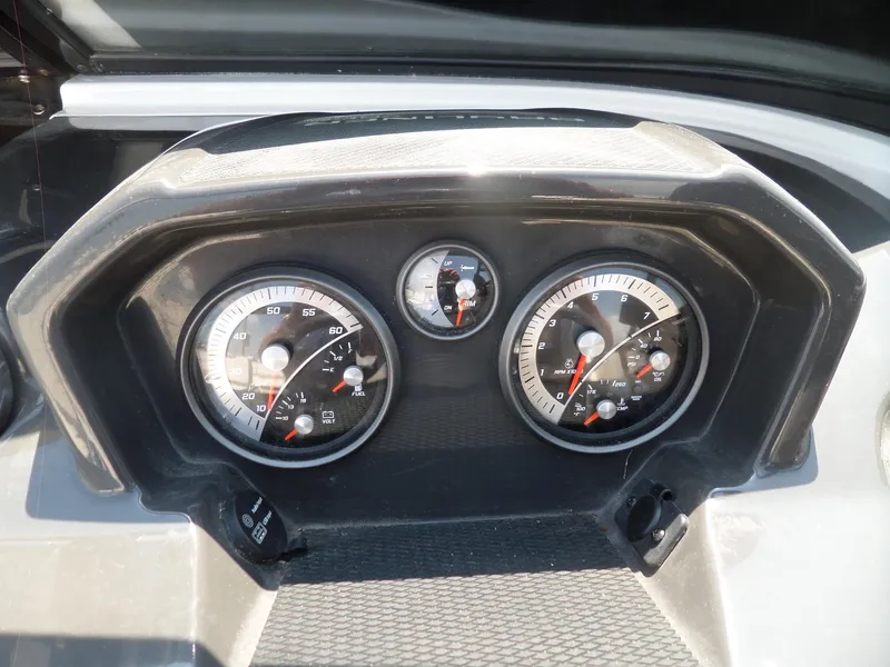 Slide: The Image of Dashboard of 2017 Bayliner VR6 Bowrider I/O with speedometer and gauges. - 15