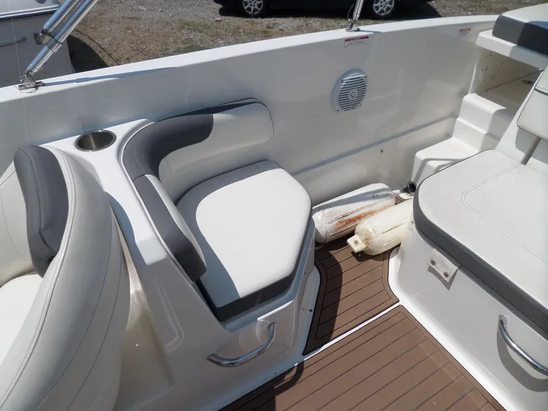 Slide: The Image of 2017 Bayliner VR6 Bowrider I/O interior with cushioned seating and cup holder. - 21