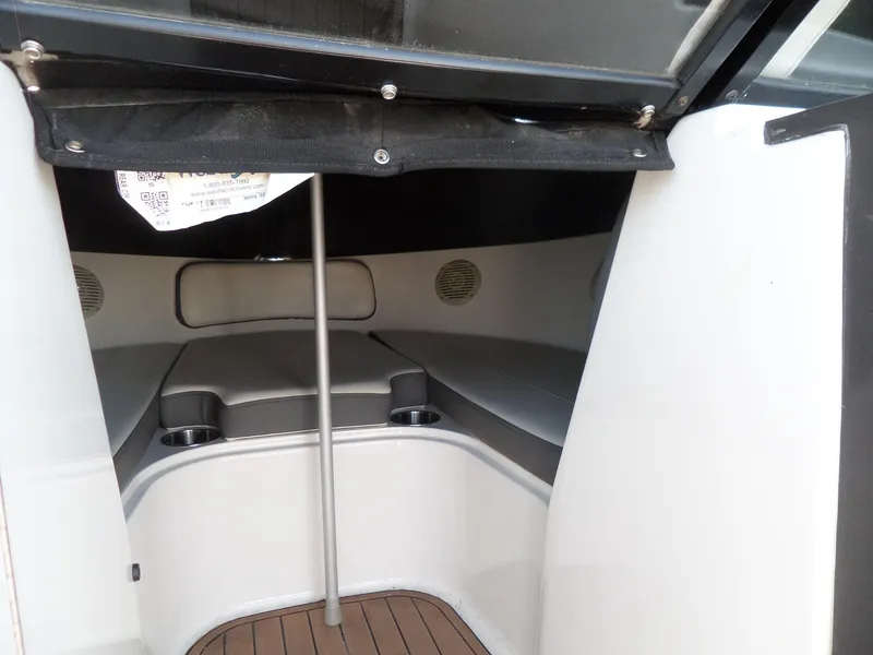 Slide: The Image of 2017 Bayliner VR6 Bowrider I/O interior cabin with seating and cup holders. - 34