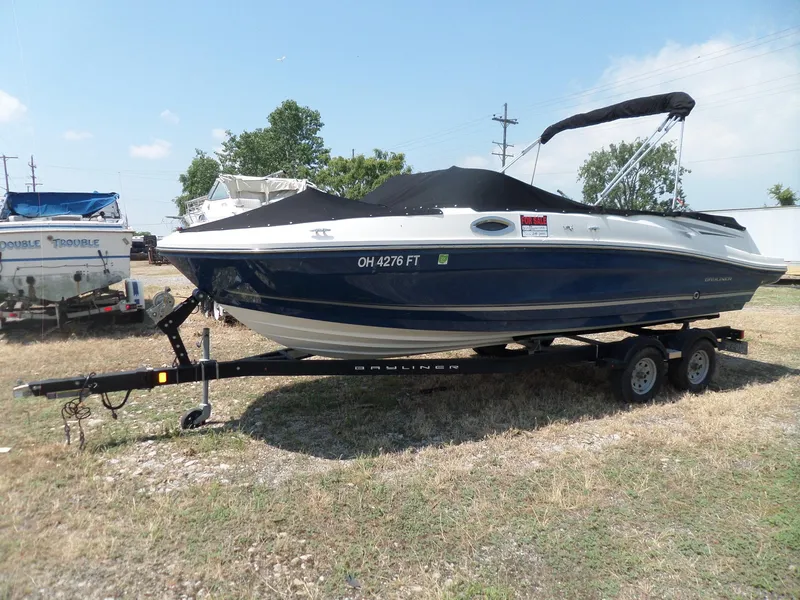 Slide: The Image of 2017 Bayliner VR6 Bowrider I/O on trailer, covered, for sale outdoors. - 6
