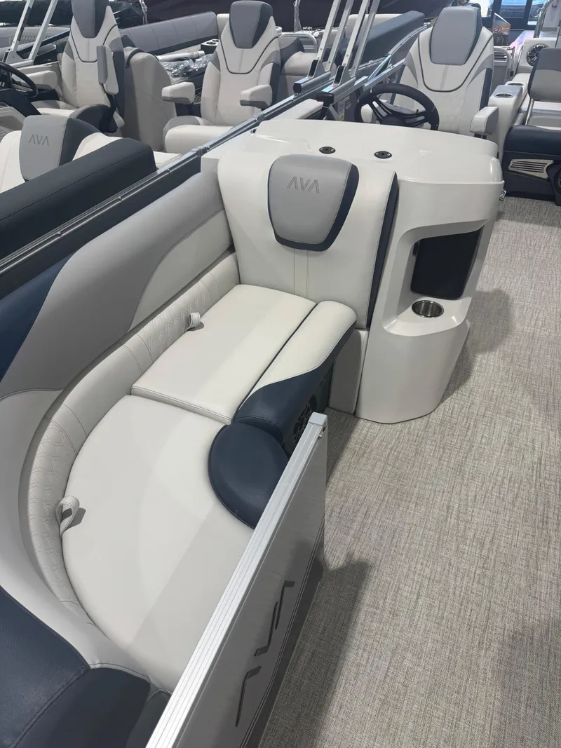 Slide: The Image of 2025 Avalon 2385 25 LSZ VRL boat interior with plush seating and modern design. - 3