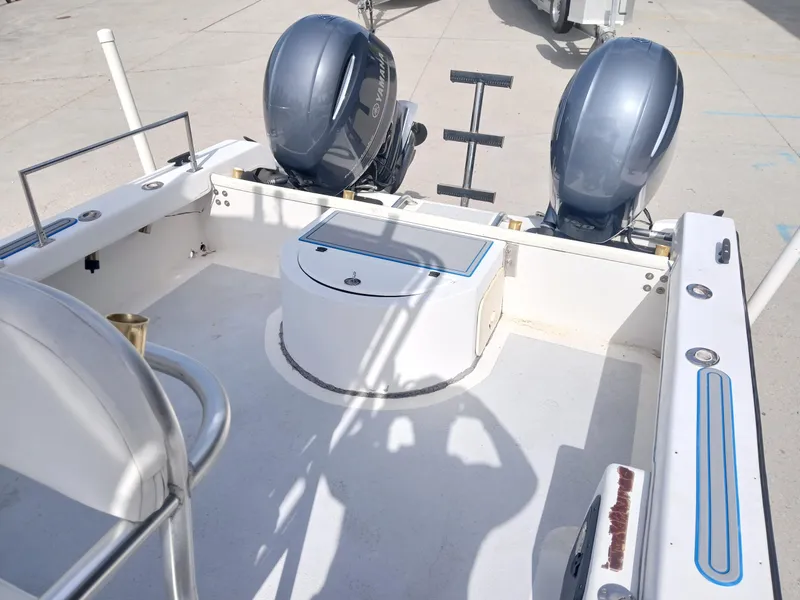 Slide: The Image of 2005 Twin Vee 26 Weekender boat interior with dual Yamaha outboard motors. - 3