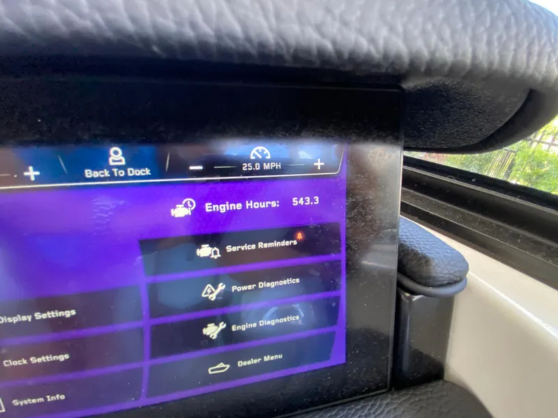 Slide: The Image of 2024 Nautique Super Air Nautique G21 dashboard displaying 25 MPH speed and 543.3 engine hours. - 14