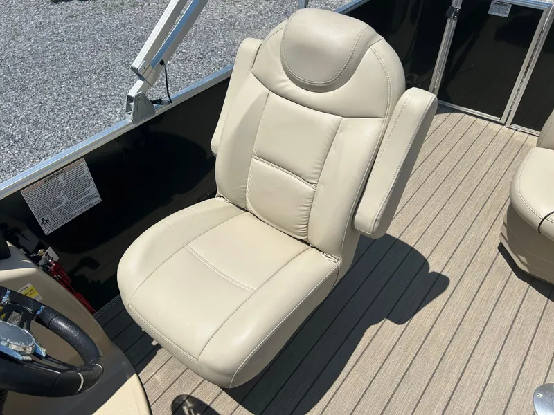 Slide: The Image of Beige captain's chair on 2018 Sylvan Mirage 8522 Cruise boat deck. - 13
