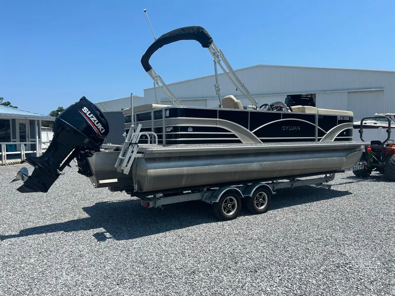 Slide: The Image of 2018 Sylvan Mirage 8522 Cruise pontoon boat with Suzuki outboard motor on trailer. - 3