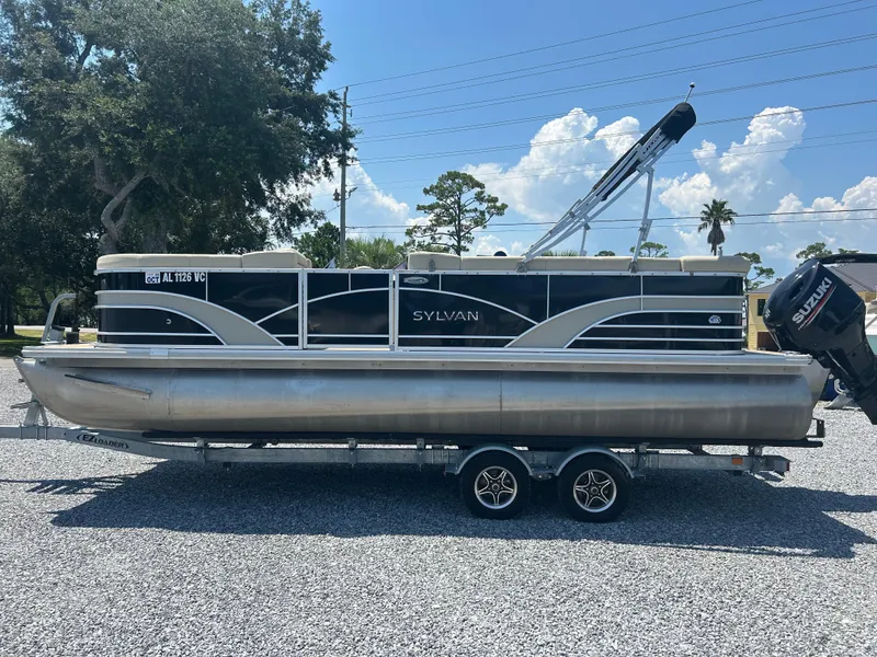 Slide: The Image of 2018 Sylvan Mirage 8522 Cruise pontoon boat on trailer, parked outdoors. - 6