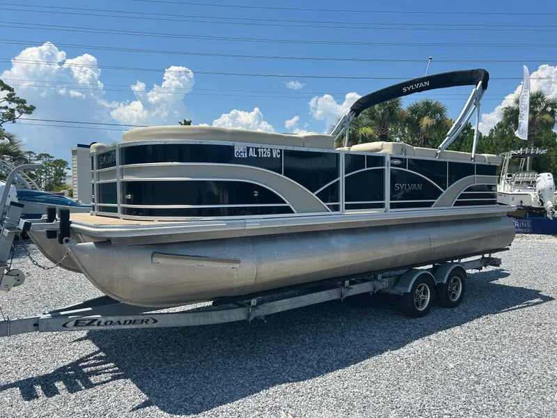 Slide: The Image of 2018 Sylvan Mirage 8522 Cruise pontoon boat on trailer, parked outdoors. - 7