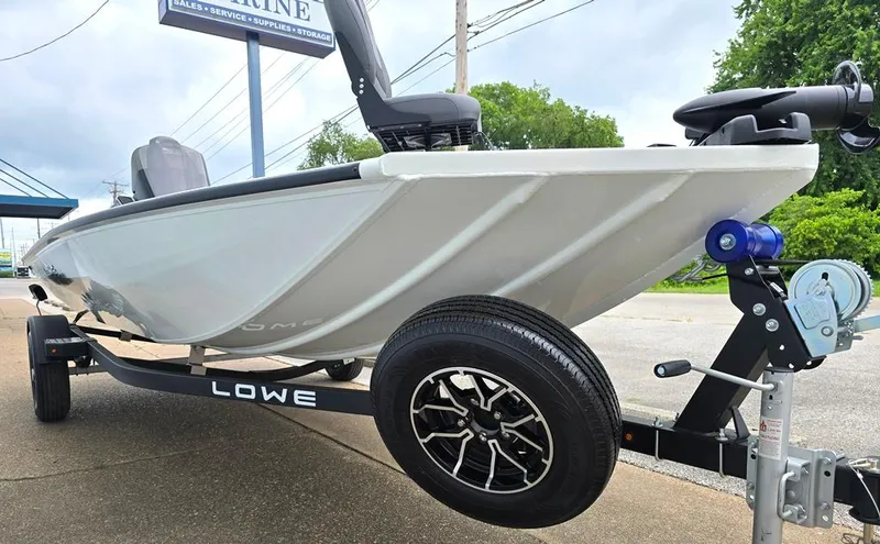 Slide: The Image of Spare tire & mount. Aluminum mag wheels. All welded heavy duty mod vee aluminum hull with reinforced keel runner - 8