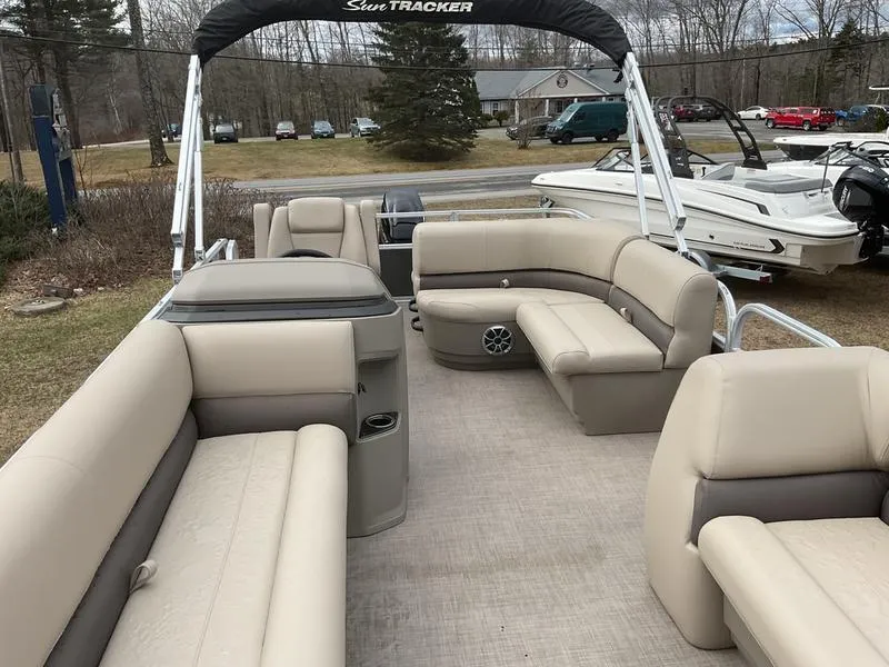 Slide: The Image of 2025 Sun Tracker PARTY BARGE® 18 DLX pontoon boat with spacious seating and canopy. - 4