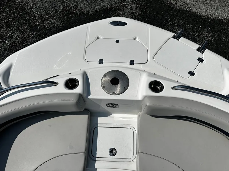 Slide: The Image of 2024 Godfrey 231 Center Console boat interior with seating and storage compartments. - 13