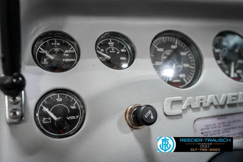 Slide: The Image of Dashboard of a 1991 Caravelle I2300CC with temperature and voltage gauges. - 29