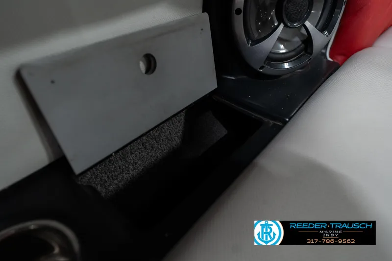 Slide: The Image of Interior of 2017 Malibu Wakesetter 25 LSV with speaker and storage compartment. - 27