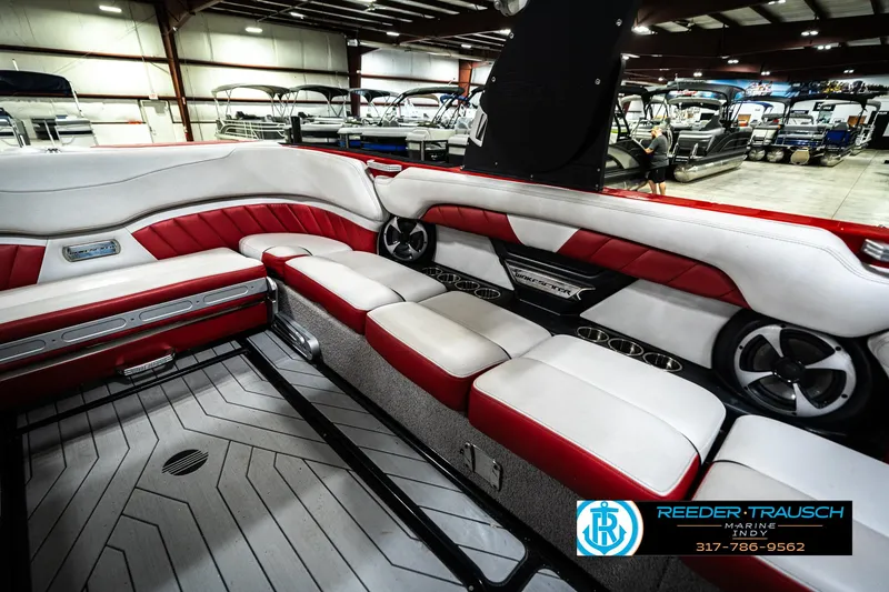 Slide: The Image of Interior of 2017 Malibu Wakesetter 25 LSV boat with red and white seating. - 31