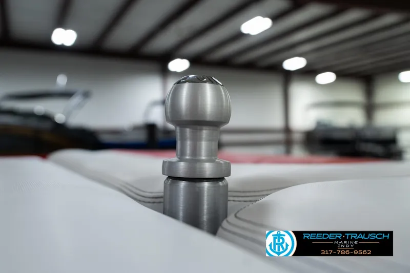 Slide: The Image of Close-up of a 2017 Malibu Wakesetter 25 LSV boat detail in a showroom. - 43