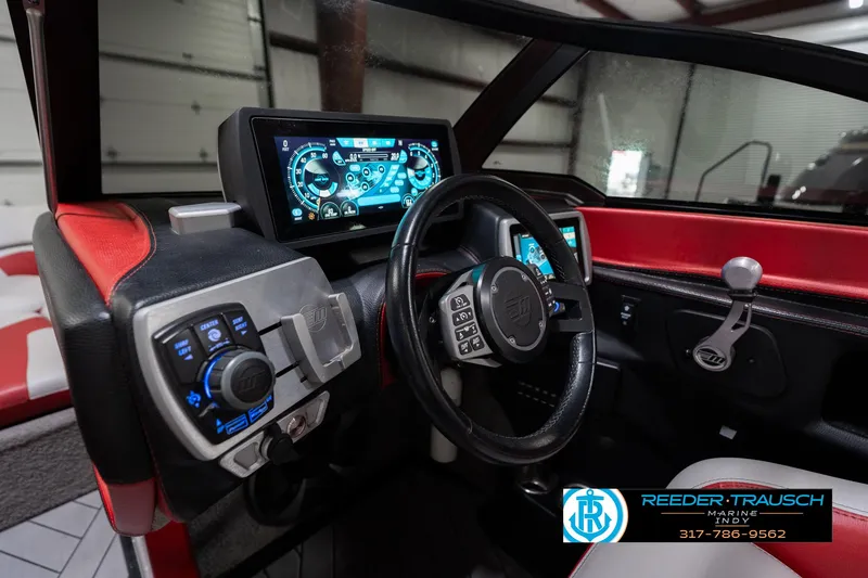 Slide: The Image of 2017 Malibu Wakesetter 25 LSV dashboard with advanced controls and touchscreen display. - 44