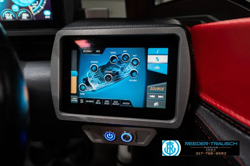 Slide: The Image of Touchscreen control panel in a 2017 Malibu Wakesetter 25 LSV boat dashboard. - 49