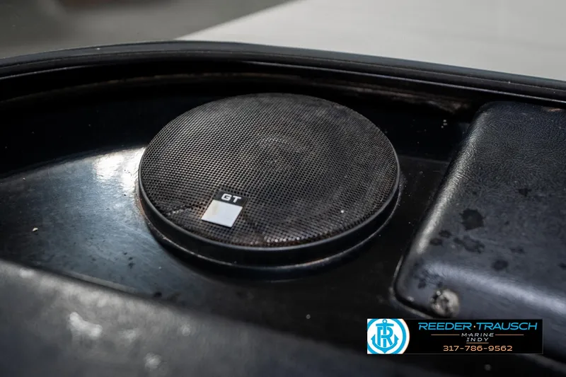 Slide: The Image of Speaker in a 1997 Malibu Response boat dashboard, featuring GT branding. - 35