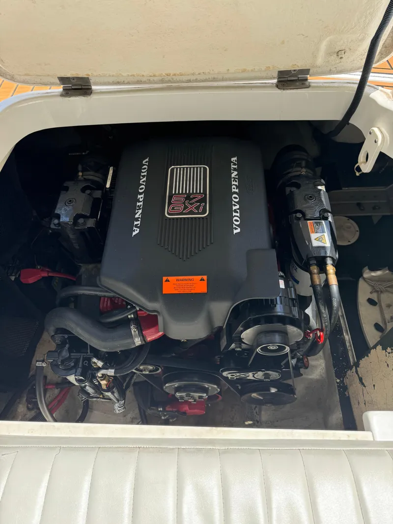 Slide: The Image of Volvo Penta engine in a 2002 Cobalt 240 boat, showcasing mechanical components. - 11