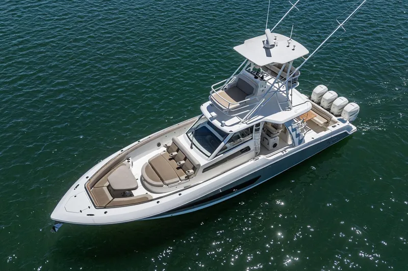 Slide: The Image of 2017 Boston Whaler 42 OUTRAGE boat on open water, aerial view. - 10