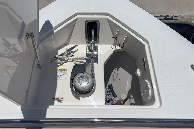 Slide: The Image of Anchor compartment of 2017 Boston Whaler 42 OUTRAGE with rope and winch. - 16