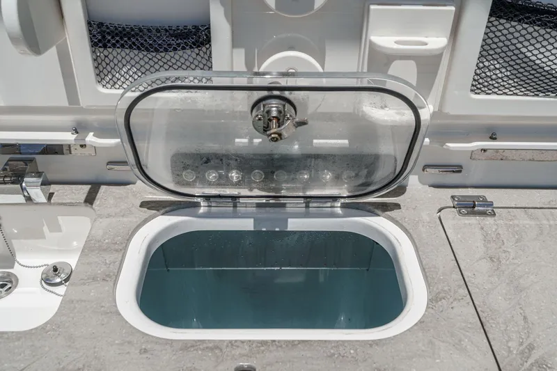 Slide: The Image of Livewell on 2017 Boston Whaler 42 OUTRAGE boat, open lid, marine equipment. - 33