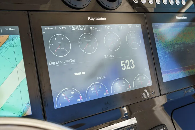 Slide: The Image of Raymarine display on 2017 Boston Whaler 42 OUTRAGE showing engine data and fuel levels. - 40