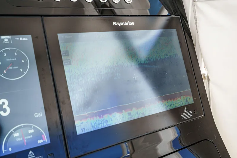 Slide: The Image of Raymarine display on 2017 Boston Whaler 42 OUTRAGE boat dashboard. - 41
