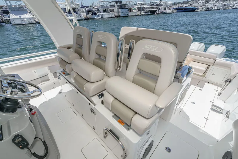 Slide: The Image of Luxurious seating on 2017 Boston Whaler 42 OUTRAGE boat, docked at marina. - 45