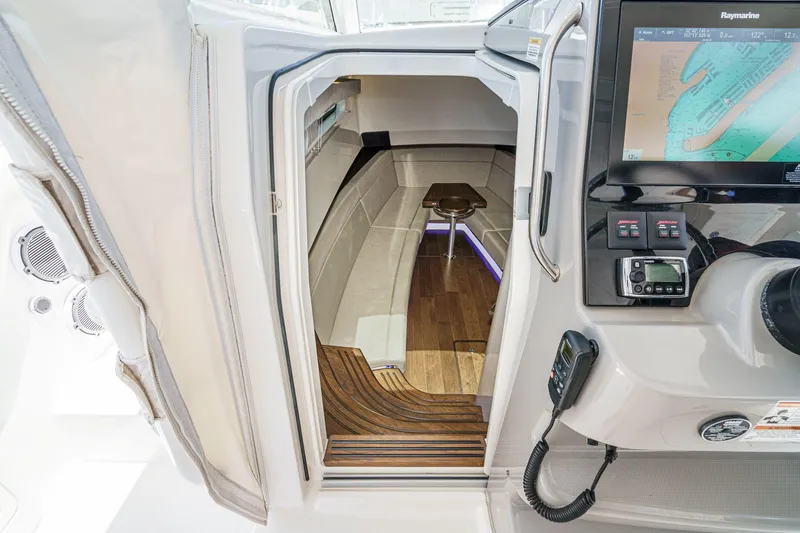 Slide: The Image of Interior view of 2017 Boston Whaler 42 OUTRAGE cabin with navigation equipment. - 59
