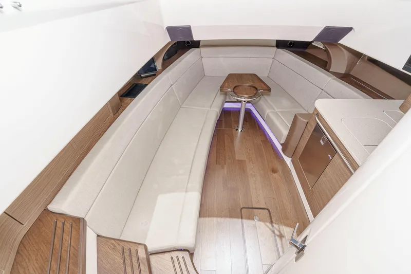 Slide: The Image of Luxurious interior of 2017 Boston Whaler 42 OUTRAGE with elegant seating and wood finish. - 60