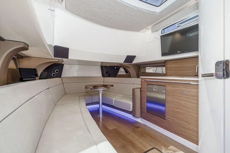 Slide: The Image of Luxurious interior of 2017 Boston Whaler 42 OUTRAGE yacht with modern amenities and seating. - 61