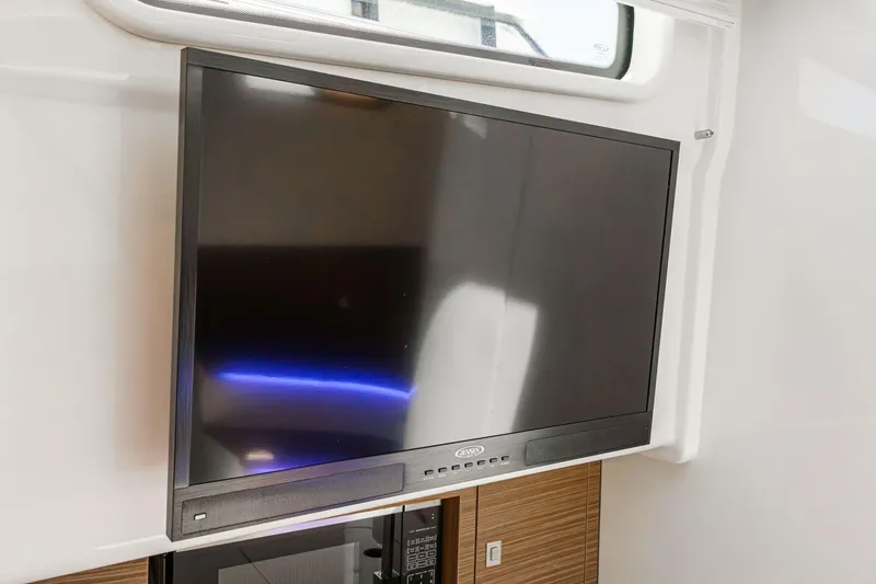 Slide: The Image of Flat-screen TV inside 2017 Boston Whaler 42 OUTRAGE boat cabin. - 67