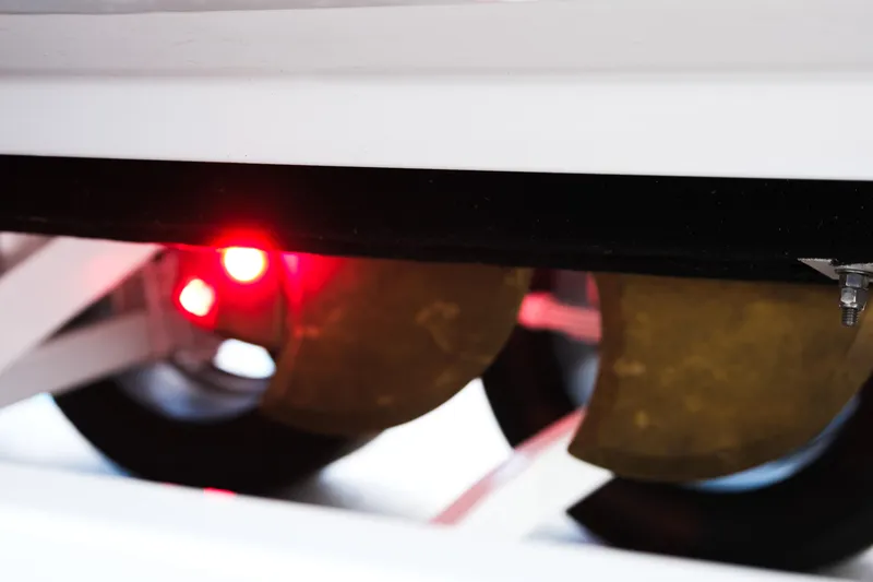 Slide: The Image of 2025 Supra SE450 boat propeller with red light reflection. - 10