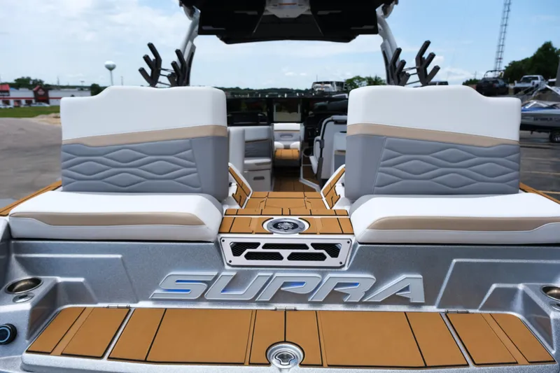 Slide: The Image of 2025 Supra SE450 boat interior with stylish seating and modern design. - 14