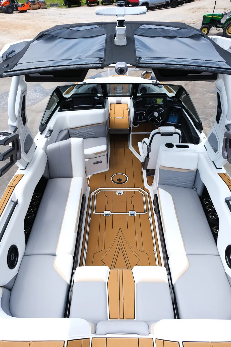 Slide: The Image of 2025 Supra SE450 boat interior with sleek seating and modern design. - 17