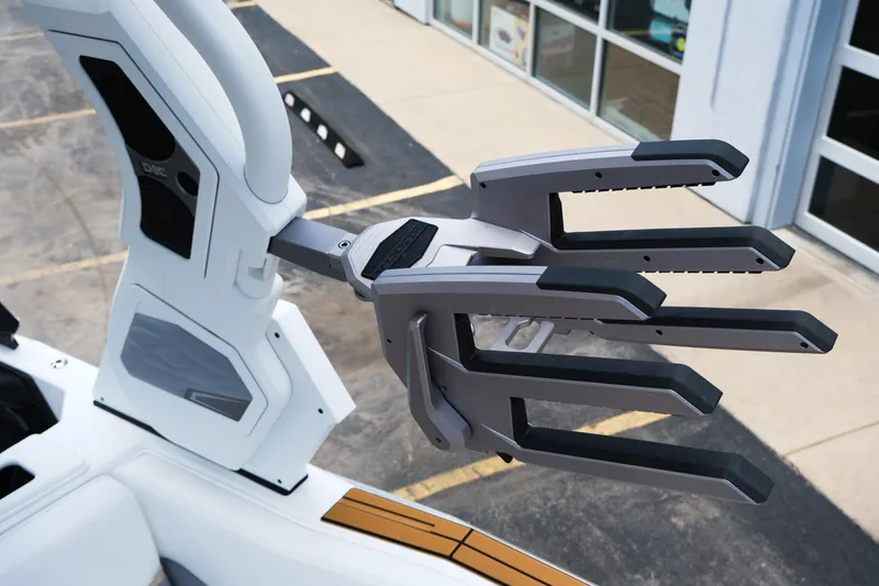 Slide: The Image of 2025 Supra SE450 boat with advanced wakeboard rack design. - 18