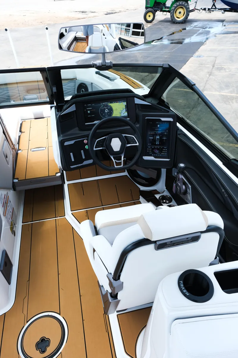 Slide: The Image of 2025 Supra SE450 boat interior with modern dashboard and luxurious seating. - 19