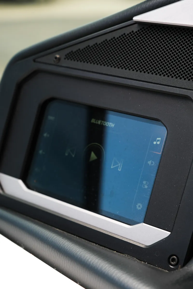 Slide: The Image of 2025 Supra SE450 dashboard with touchscreen display and Bluetooth connectivity. - 22