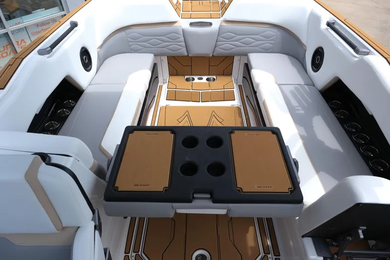 Slide: The Image of Luxurious interior of 2025 Supra SE450 boat with spacious seating and modern design. - 26