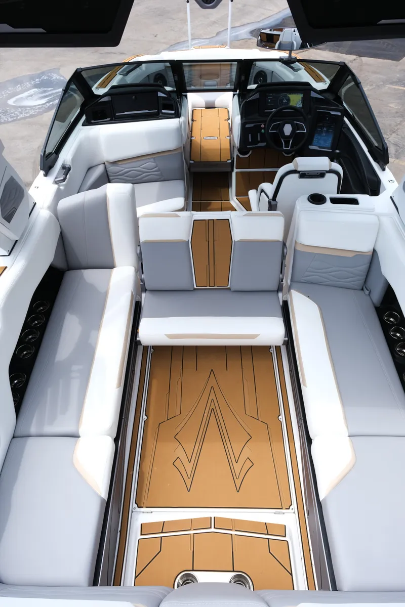 Slide: The Image of 2025 Supra SE450 boat interior with luxurious seating and modern dashboard design. - 27