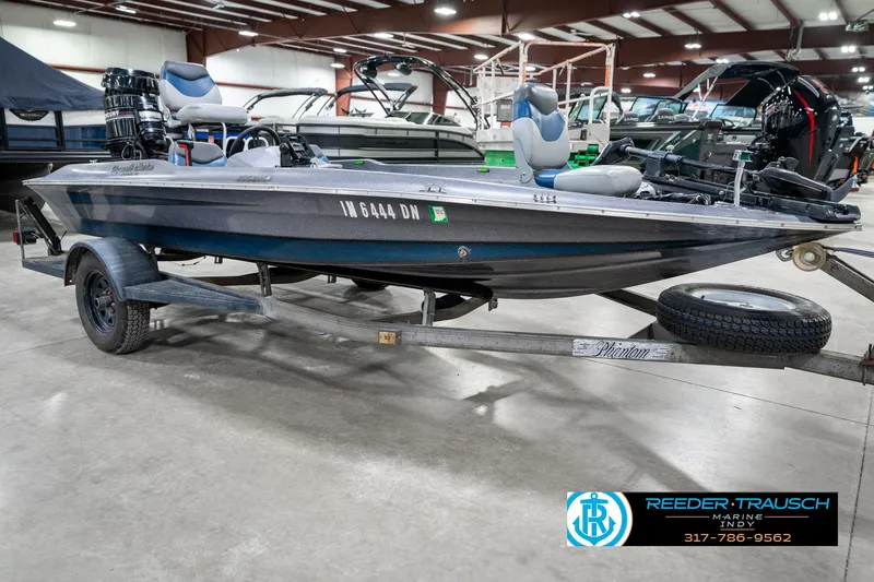 Slide: The Image of 1986 Phantom Panther boat on trailer in indoor showroom, Reeder Trausch Marine. - 4