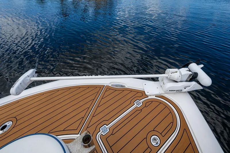 Slide: The Image of 2023 Tidewater 2700 Carolina Bay boat deck with Minn Kota trolling motor. - 23