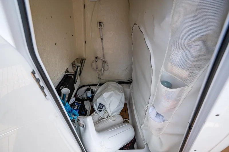 Slide: The Image of Interior storage area of 2023 Tidewater 2700 Carolina Bay boat, featuring various equipment. - 43