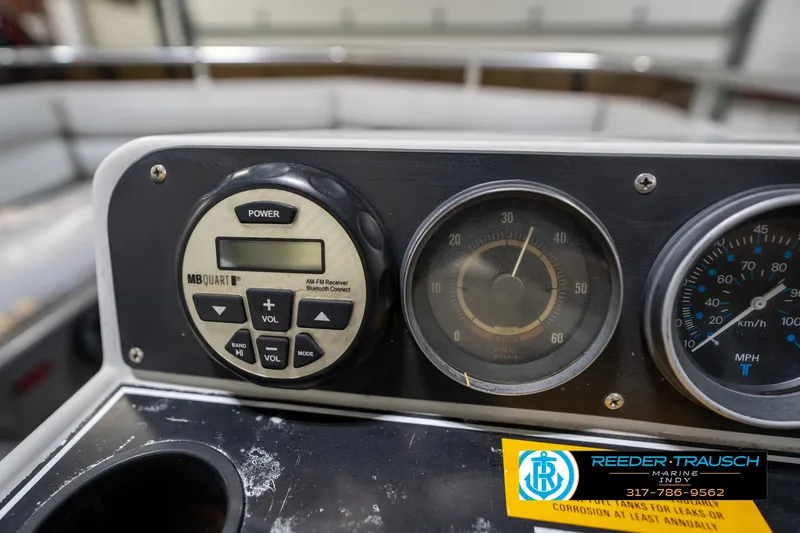 Slide: The Image of Dashboard of a 1987 Hurricane 176 Deck Boat with gauges and MB Quart receiver. - 29